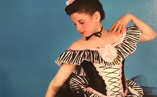young dancer in costume