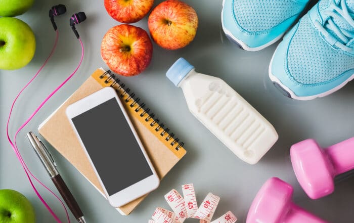 phone and milk with exercise equipment
