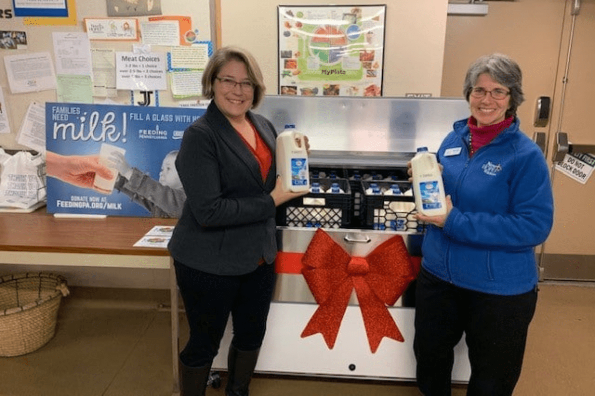 Dairy farmers spread holiday cheer in Central Pennsylvania with milk cooler donation