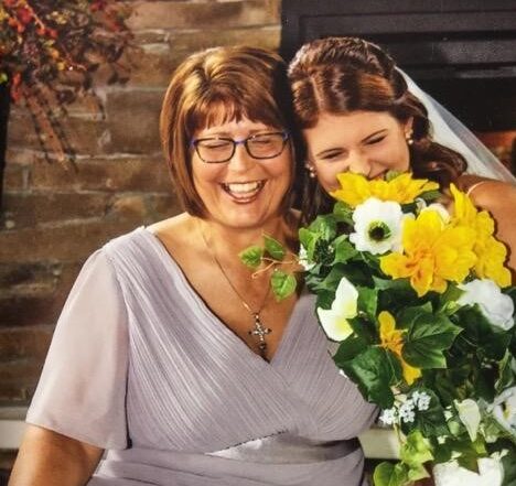 mother and daughter on daughter's wedding day