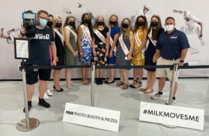Dairy Princesses and Spectrum News visit the Milk Moves Me GIF booth in the Dairy Products Building.