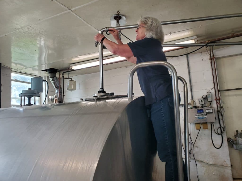 farmer at the bulk tank