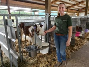 farmer with a calf