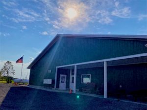 exterior of a barn at midday