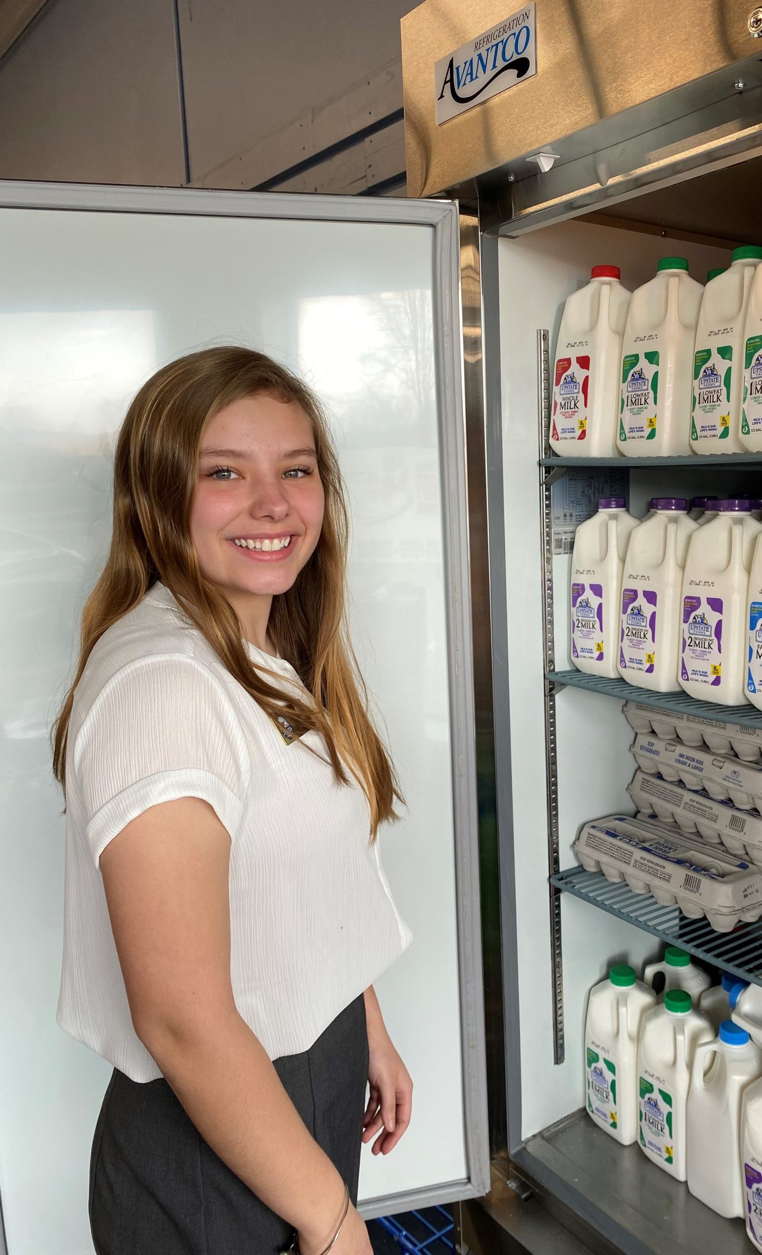 Dairy Farmers Help Donate Milk, Cooler to Local Food Bank for Families in Need