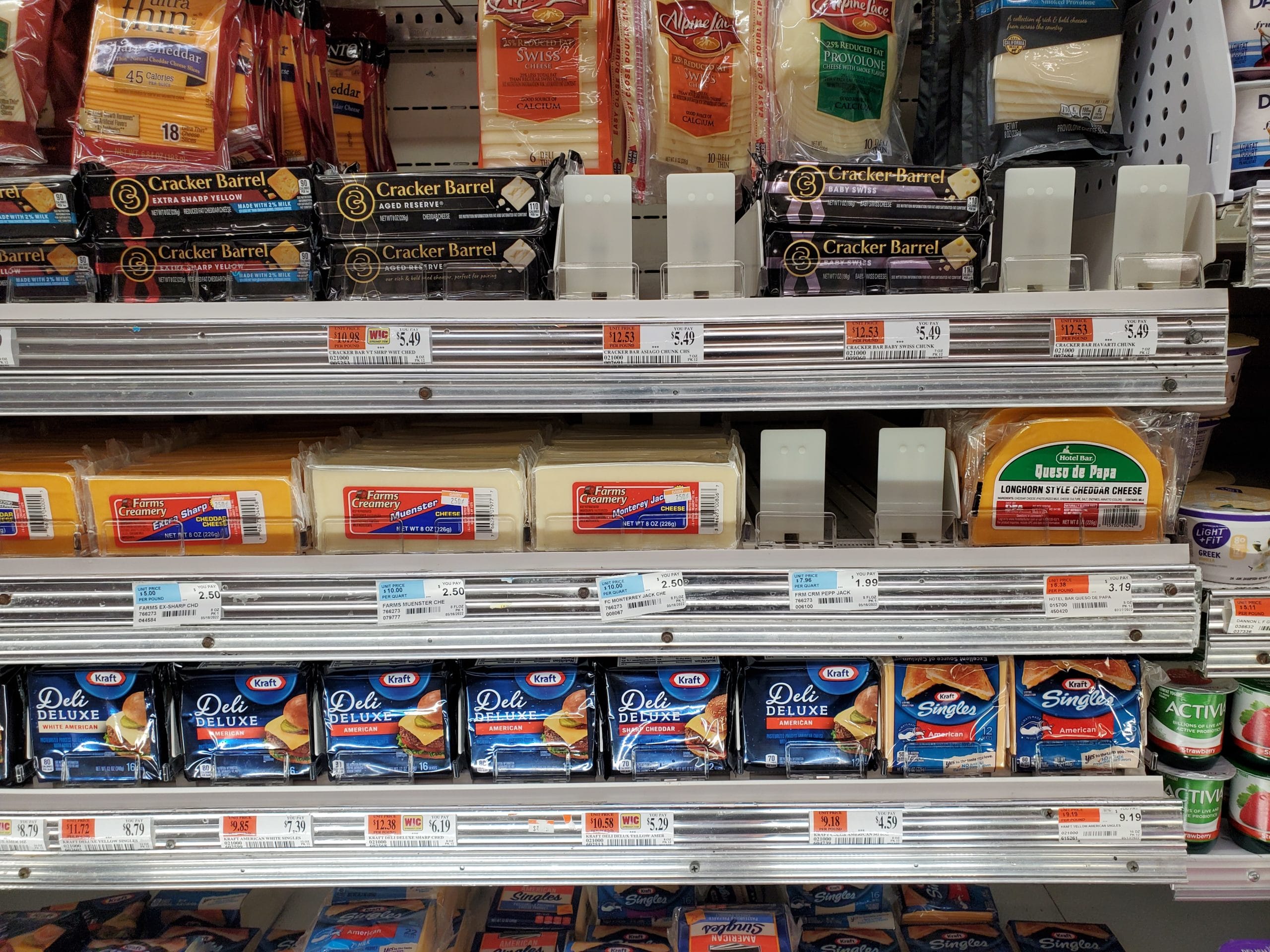 Yogurt Dividers, Cheese Pushers Keep Dairy Cases Organized to Help Increase Sales