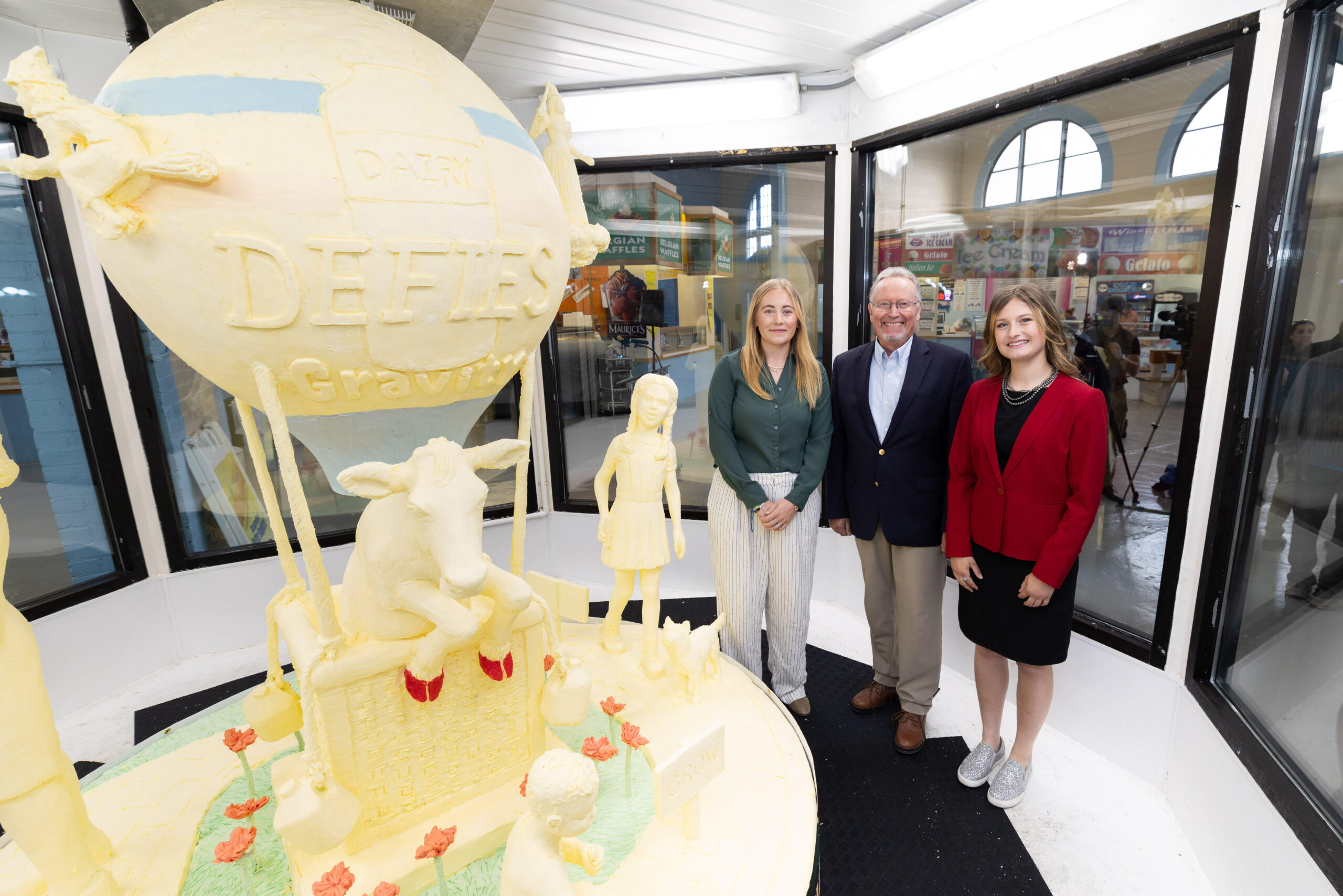 2025 NYS Fair Butter Sculpture – Jaime Mowry – Commissioner Richard Ball – Dairy Ambassador Olivia Shawley